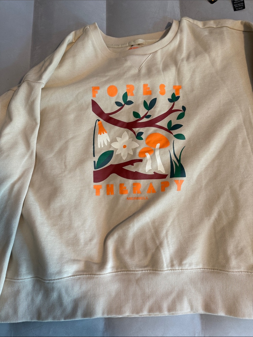 Women’s Merrell Cream Sweatshirt with Orange, Green & Brown Forest Graphic